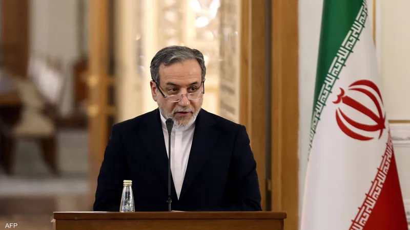 عراقجي يهاجم المستشار الألماني:"رمز السذاجة السياسية"